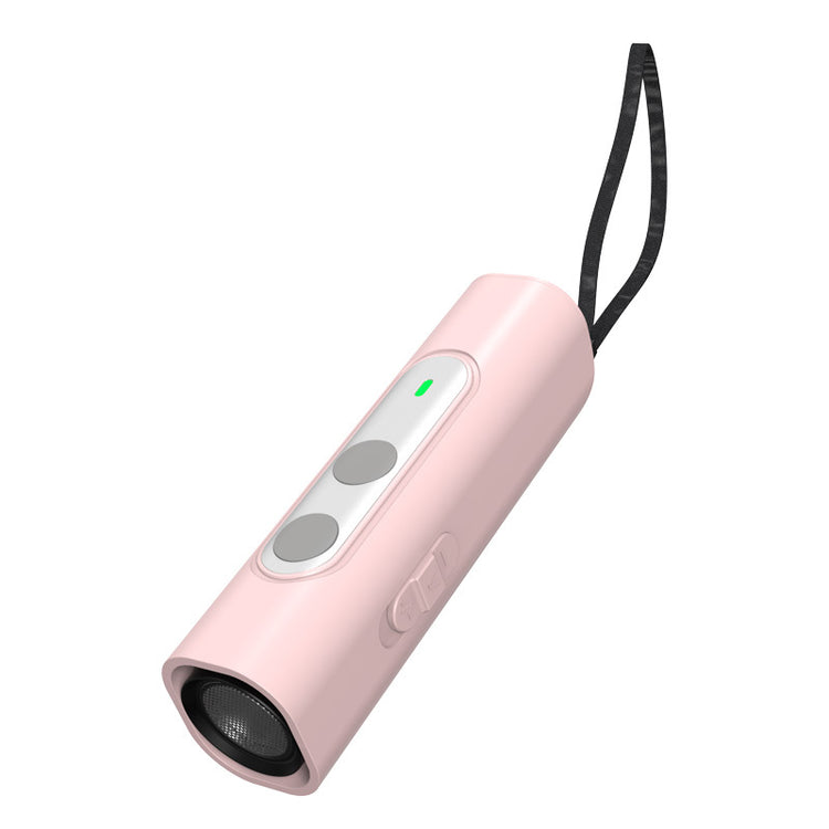 Black Muffy ultrasonic dog repeller with flashlight feature, compact device for humane dog deterrence and outdoor safety.