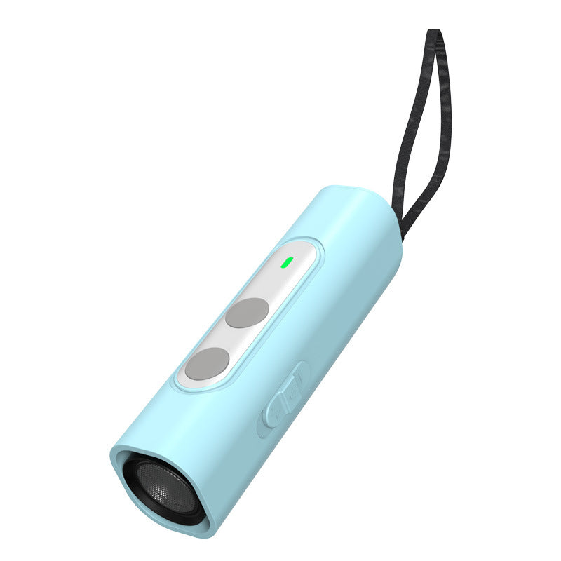Muffy 2023 Ultrasonic Dog Repeller with built-in flashlight, black handheld device for pet deterrence and outdoor safety.